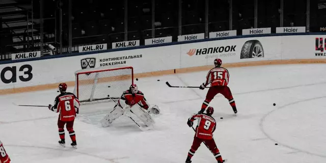 Why are hockey pucks sometimes frozen before a game?