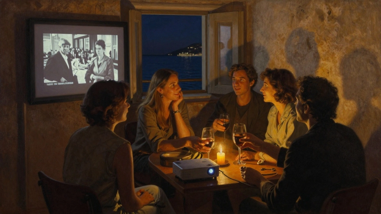 A hidden gathering in La Condamine watches a film together, their focus on each other—not the screen—in candlelit intimacy.